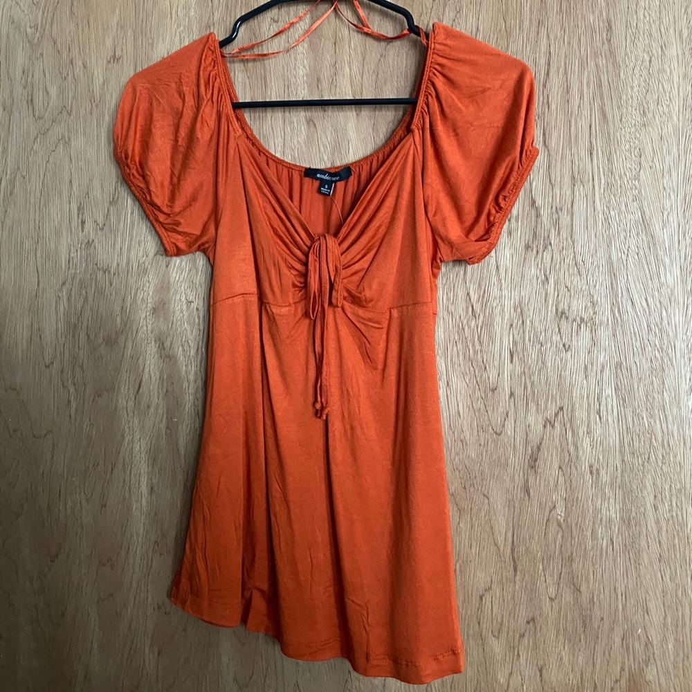 orange off the shoulder top